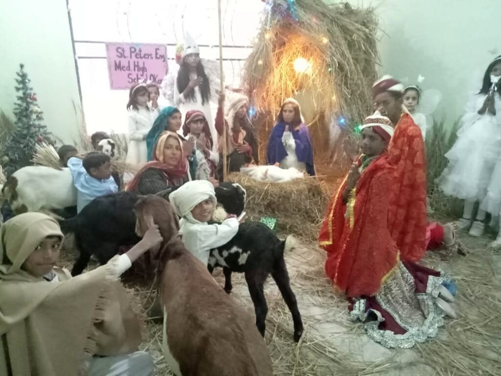Christmas play: nativity scene with Jesus, Mary, Joseph, angels, shepherds, goats, 3 kings